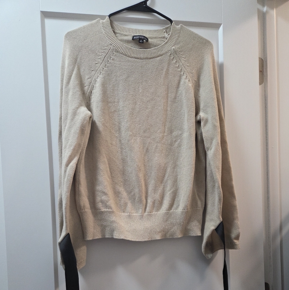 Elegant Cream Sweater with Black Accents